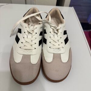 White and Black Sneakers with Tan Accents from tik tok